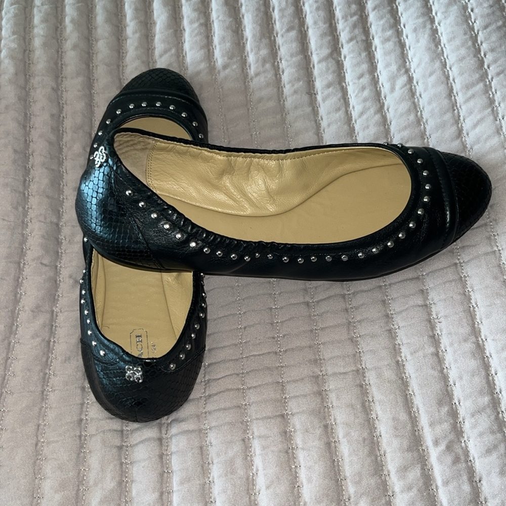 Coach flats black leather with silver stud new never worn.
